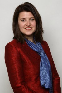 Andrea MacDonald-website photo standing cropped.jpg